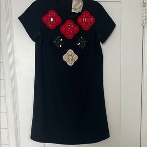 Stylish Black Mini Dress with Red and Cream Accents